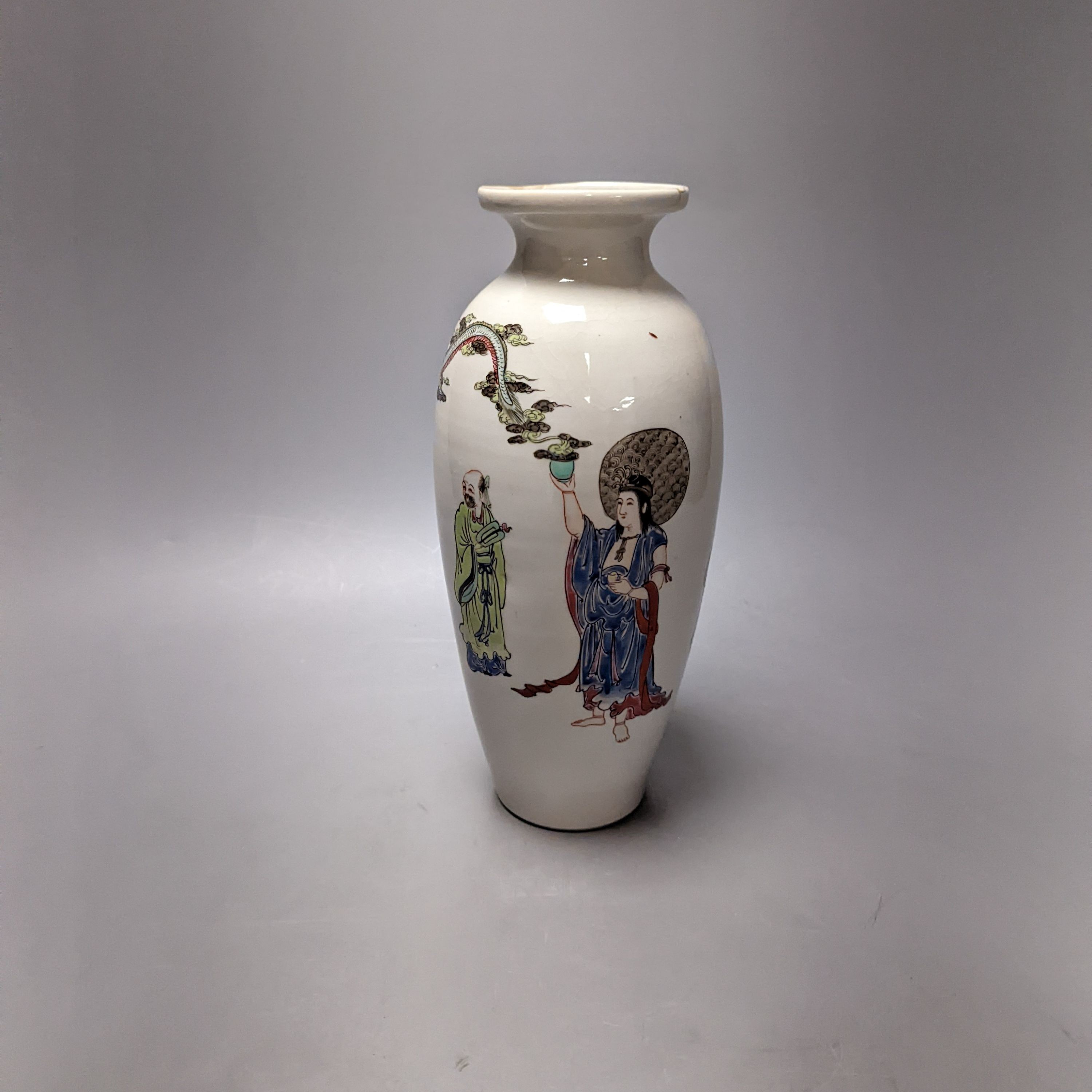 An unusual Worcester polychrome enamelled vase, c.1755-60, of unusual shape, finely painted with a Chinese immortal summoning a dragon with two sages and a boy, 24cm high, cracked, rim faults